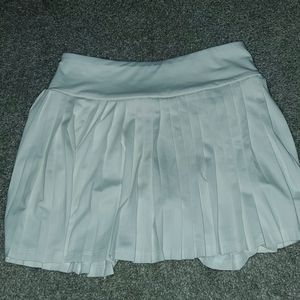 I am selling a white tennis skirt.